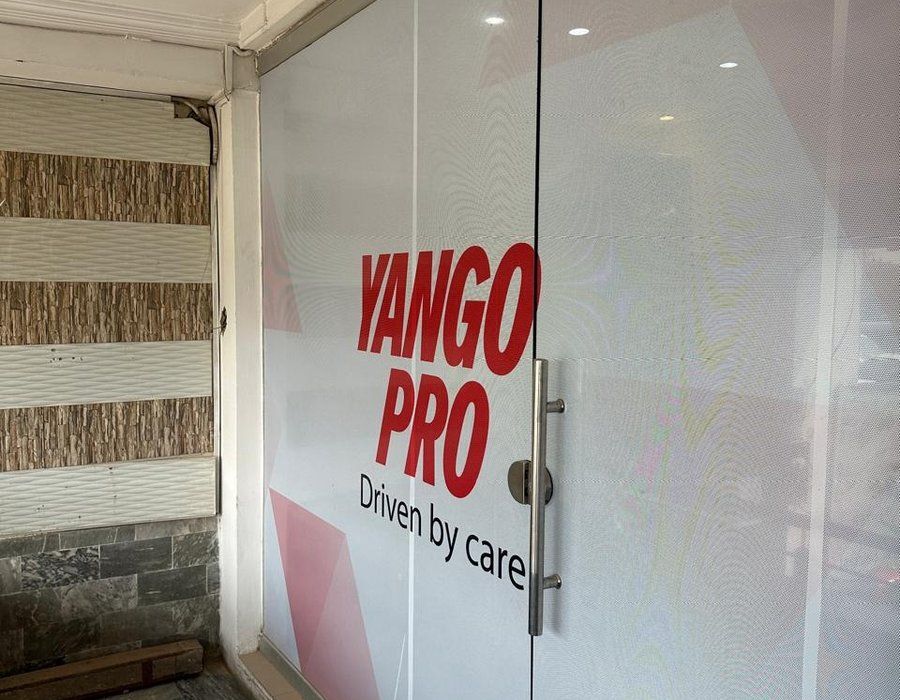 Yango Pro signage on the Capital Captains office door